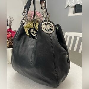 Michael Kors Black Hobo Bag with Silver Accents
